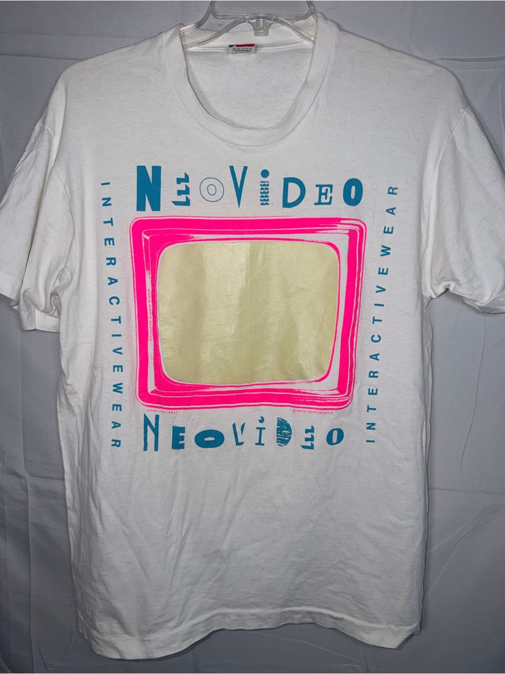 Glow in the dark vintage 1980s Neovideo Interactivewear bright pink neon tv
